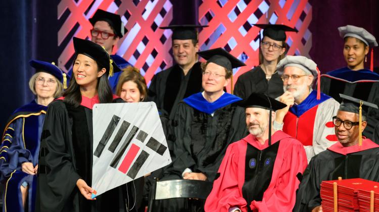 Mayor Michelle Wu holds up MIT kite